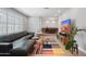 Bright living room features wood floors, modern furnishings, and an open layout at 7533 N 8Th St, Phoenix, AZ 85020