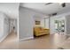 Bright and open living room with a comfortable sofa, tile floors, and natural light at 7533 N 8Th St, Phoenix, AZ 85020