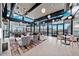 Bright lobby with modern decor, expansive windows, and lounge seating with ample natural light and comfortable design at 7836 E Quintana Ave, Mesa, AZ 85212