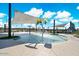 Bright splash pad offers fun for all ages, complete with shade sails and whimsical water features under a sunny sky at 7836 E Quintana Ave, Mesa, AZ 85212