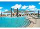 Beautiful community pool featuring shade, ample lounging space, and refreshing, clear water at 7836 E Quintana Ave, Mesa, AZ 85212