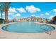 Sparkling community pool with ample seating, lush landscaping, and clear, inviting water for residents to enjoy at 7836 E Quintana Ave, Mesa, AZ 85212