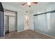 View of a bedroom including closet, door to bathroom, and accent wall at 820 W Hononegh Dr, Phoenix, AZ 85027