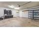Well-lit garage offering a workbench, shelving, and ample room for projects and storage at 820 W Hononegh Dr, Phoenix, AZ 85027