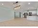 Open-concept kitchen with stainless steel appliances and a spacious dining area at 820 W Hononegh Dr, Phoenix, AZ 85027