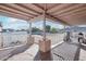 Covered patio area with views of a spacious yard and potential for outdoor living at 8343 W Calle Lejos --, Peoria, AZ 85383