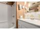 Clean bathroom with a tub, shower, and functional sink and vanity at 8632 E Delilah Ave, Mesa, AZ 85208
