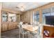 Cozy dining area features built-in cabinets and sunny windows at 8632 E Delilah Ave, Mesa, AZ 85208