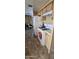 Kitchen featuring a gas range, refrigerator, and wooden cabinets at 8632 E Delilah Ave, Mesa, AZ 85208
