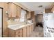 Practical kitchen layout with abundant storage and natural light at 8632 E Delilah Ave, Mesa, AZ 85208