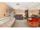 Comfortable living room with multiple seating options and neutral carpet at 8632 E Delilah Ave, Mesa, AZ 85208