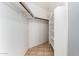 Walk-in closet featuring shelving and ample storage space at 9002 W Caribbean Ln, Peoria, AZ 85381