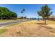 Scenic community park with lush greenery, water views, and picnic areas for relaxation and recreation at 9002 W Caribbean Ln, Peoria, AZ 85381