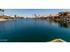 Scenic waterfront view featuring the calm canal and charming residential architecture along the banks at 9002 W Caribbean Ln, Peoria, AZ 85381