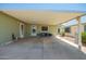 Covered carport offering shade and storage with access doors on both sides at 9822 E Main St # 4, Mesa, AZ 85207