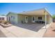 Wide carport with kayak and welcome sign, perfect for outdoor gear at 9822 E Main St # 4, Mesa, AZ 85207