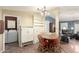 Open-concept dining area adjacent to kitchen and living spaces at 9822 E Main St # 4, Mesa, AZ 85207