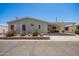 Inviting single-story home featuring a covered carport and desert landscaping at 9822 E Main St # 4, Mesa, AZ 85207