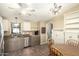 Functional kitchen with stainless steel appliances and tile floors at 9822 E Main St # 4, Mesa, AZ 85207