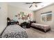 Cozy bedroom featuring two twin beds and a desk perfect for  at 1005 E Weldon Ave, Phoenix, AZ 85014