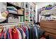Walk-in closet featuring ample shelving and rod space for organized storage at 1005 E Weldon Ave, Phoenix, AZ 85014