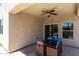 Outdoor patio featuring a ceiling fan and a dining table with chairs at 1005 E Weldon Ave, Phoenix, AZ 85014