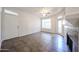 Bright living room featuring neutral walls, fireplace, and tiled flooring, providing a cozy and inviting space at 11375 E Sahuaro Dr # 1053, Scottsdale, AZ 85259