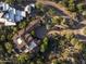 Overhead view showcases the tile roof of this luxury home surrounded by desert landscape at 11548 E Salero Dr, Scottsdale, AZ 85262