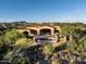 Aerial view showcasing the backyard patio with a pool and desert landscaping at 11548 E Salero Dr, Scottsdale, AZ 85262
