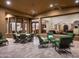 Spacious covered patio perfect for entertaining, featuring comfortable seating, a dining area, and seamless indoor-outdoor living at 11548 E Salero Dr, Scottsdale, AZ 85262