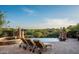 Stunning pool area with desert landscape, lounge chairs, and tranquil scenery for ultimate relaxation at 11548 E Salero Dr, Scottsdale, AZ 85262