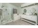Gorgeous primary bathroom featuring a double sink vanity, tub, and glass shower at 12044 S 45Th St, Phoenix, AZ 85044