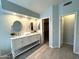 Bright bathroom featuring a double sink vanity and modern lighting at 12044 S 45Th St, Phoenix, AZ 85044