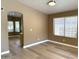 An open living room features modern floors and natural lighting at 12044 S 45Th St, Phoenix, AZ 85044