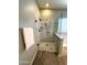 Bathroom shower features marble tile and a frameless glass door at 12044 S 45Th St, Phoenix, AZ 85044