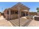 Beautiful backyard with a bar, pergola and plenty of room for entertaining at 18080 W Spencer Dr, Surprise, AZ 85374