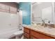 Bathroom features a decorative sink, granite countertop, and tiled shower at 18080 W Spencer Dr, Surprise, AZ 85374