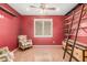 Comfortable bedroom with neutral tones, plantation shutters, and modern accents at 18080 W Spencer Dr, Surprise, AZ 85374