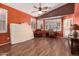 Spacious bedroom with a ceiling fan, natural light, and a desk area is perfect for a home office at 18080 W Spencer Dr, Surprise, AZ 85374