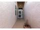 Inviting front entrance with security door and charming decor at 18080 W Spencer Dr, Surprise, AZ 85374