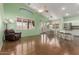 Open concept living room and kitchen offer a seamless flow for modern living at 18080 W Spencer Dr, Surprise, AZ 85374
