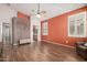 Spacious main bedroom with custom clock art and ensuite bathroom at 18080 W Spencer Dr, Surprise, AZ 85374