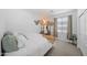 Cozy bedroom with neutral colors, decorative wall art, and natural light, creating a comfortable space at 22205 W Ashleigh Marie Dr, Buckeye, AZ 85326