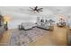 Bright and airy living room open to the kitchen and dining area, perfect for entertaining guests at 22205 W Ashleigh Marie Dr, Buckeye, AZ 85326