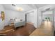 Spacious office featuring sleek desk, wood flooring, and an open layout, enhancing both style and functionality at 22205 W Ashleigh Marie Dr, Buckeye, AZ 85326