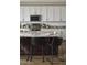 Modern kitchen with granite countertops, stainless steel appliances, and a stylish breakfast bar at 2854 E Virginia St, Mesa, AZ 85213