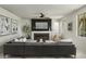 Inviting living room with a modern fireplace, comfortable seating, and stylish decor at 2854 E Virginia St, Mesa, AZ 85213