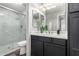 Bathroom showcasing a glass enclosed shower, modern vanity, and updated fixtures at 29606 N Tatum Blvd # 245, Cave Creek, AZ 85331
