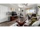 Inviting living room with a flatscreen TV, sliding glass door to the patio, and modern furniture at 29606 N Tatum Blvd # 245, Cave Creek, AZ 85331