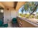 Outdoor patio area with comfortable chairs and a table, ideal for relaxing at 29606 N Tatum Blvd # 245, Cave Creek, AZ 85331